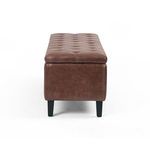 End view of Jefferson Trunk showing tufted top and tapered black legs