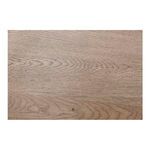 Close view of finely grained oak wood surface showcasing natural color and pattern