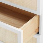 Open drawer showing light natural wood interior with smooth finish