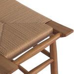 Top view showing woven wicker seat pattern and curved teak stretcher detail