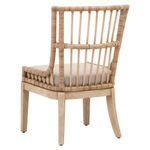 Rear three-quarter view showing rattan backrest structure and cushioned seat from behind