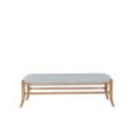 Blurry smaller front view of the bench focusing on proportions and leg style