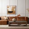 Rug under coffee table and brown sectional sofa with modern wall art in neutral living room