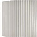 Lit Edelmar Table Lamp with clear faceted base and pleated lampshade on white background