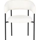 Front view highlighting the rounded seat and backrest of Cassia Dining Chair in boucle