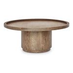 Cohen coffee table in solid oak with tray-style round top and cylindrical pedestal base in rich brown finish