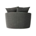 Back view showing fully upholstered rounded back without visible legs or frame
