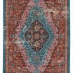 Traditional rectangular rug with distressed bohemian medallion in rust, teal, pink, and blue colors