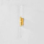 Millerton Wall Sconce with aged brass finish, vertical clear glass rods featuring textured bubbles, illuminated ends