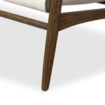 Close-up of tapered oak chair leg with visible wood grain