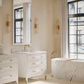 Close-up detail of Verona Vanity drawer handles showing champagne-finished gold ferrules