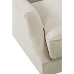 Close view of the armrest curve showing subtle fabric folds