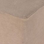 Detailed corner seam of flax linen slipcover on bench upholstery
