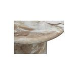 Close-up of tapered edge detailing and texture on the hand-finished concrete top