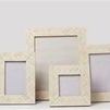 Back angled view of four Emerson Picture Frames showing frame thickness and white chevron pattern