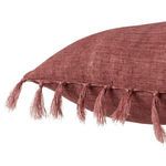 Close-up of knotted tassels and textured linen fabric on the Majere Solid Rose Pillow edge