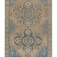 Traditional rectangular rug with green and blue medallion pattern and beige background