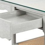 Partially opened drawer showing interior in matching cerused oak finish with scalloped edges