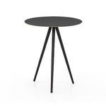 Close-up side angle emphasizing hammered detail on the table’s circular metal surface