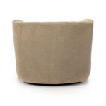 Back view of Mila Chair showing seamless upholstery and rounded top edge