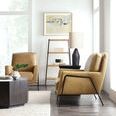 Two chairs styled in bright living room with hardwood floors, white rug, black lamp, ladder shelf, and abstract wall art