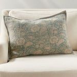 Pascaline Pillow styled on an ivory sofa highlighting its size and shape in a living room setting
