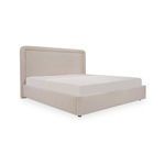 Simon Storage Bed angled view showing rounded headboard and side panel upholstery