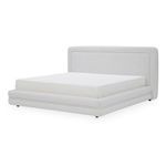 Angled side view of Tory Pebble Bed showing cushioned rails and footboard with rounded framing