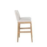 Side profile of Gaston Stool showing curved backrest and seat thickness