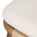Lower wood chair leg with visible wood grain and rounded foot