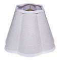 Tapered lamp shade with softly scalloped edges, natural raffia texture, and linen trim with brass harp