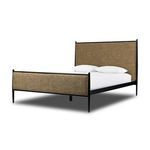 Xander Upholstered Bed shown at a three-quarter angle highlighting the iron frame and fabric panels