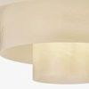 Close-up of layered flush mount showing texture and subtle beige tone of cloud glass shade
