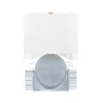 Front view of Leeston Tall Table Lamp against white background with white shade and textured blue base