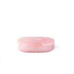 Front view of pink alabaster oval box emphasizing smooth edges and soft color gradation