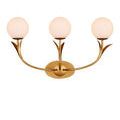 Top view showcasing circular gold base and stems supporting globe lights