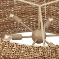 Straight side silhouette of chandelier highlighting its rounded horizontal form