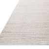 Angled close-up of rug showing low pile with subtle ribbed texture