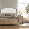 Vineyard Row bed styled in bright bedroom with natural light, side table, and greenery