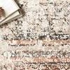 Detailed top view of rug with open book and dried flower, highlighting pattern variations