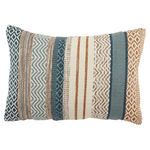 Lumbar pillow with geometric tribal pattern in blue, gold, and cream with textured boucle fabric and stripes