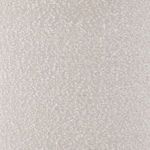 Close-up macro of cream boucle woven fabric texture on chair back