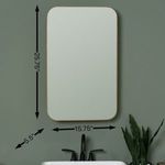 Cabinet mounted on wall with measurements overlay showing 25.75 inch height and 15.75 inch width