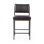 Benton Stool with slim black iron frame, solid oak decking, and black top-grain leather seat and backrest