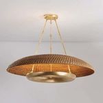 Oaklyn Chandelier lit, showing warm light diffusing through woven rope shade from beneath gold leaf trough