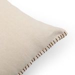Close-up of corner stitching detail with contrasting darker thread on Calvin Outdoor Pillow
