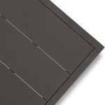 Close-up detail of corner showing slat gaps and frame edges on table surface