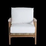 Front view showing straight teak armrests and clean lines with white seat and back cushions.