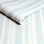 Close-up of rolled wallpaper showing brushstroke texture and vertical pastel blue and white stripes