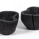 Two bowls side by side showing size contrast and similar black carbonized finish